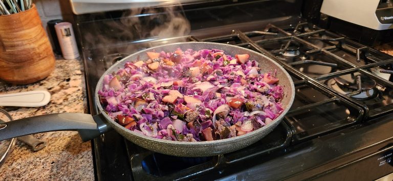 Red cabbage, ground beef, apples and diced onion make a sweet skillet meal for home or camping