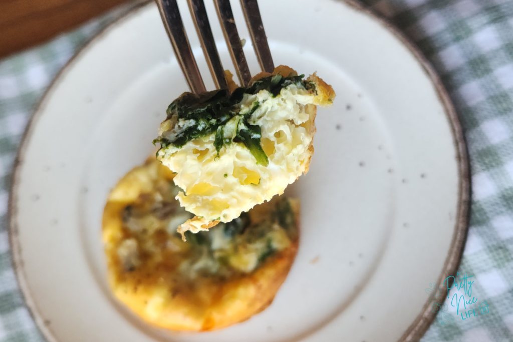 Silky custard inside a bite of finished egg muffin. 